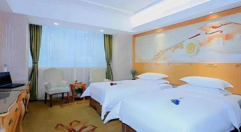 Bed in Vienna Hotel Shandong Laizhou Langhu International Plaza Bed in Vienna Hotel Shandong Laizhou Langhu International Plaza