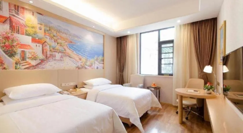 Bed in Vienna Hotel Yunnan Dali Ancient City Scenic Spot