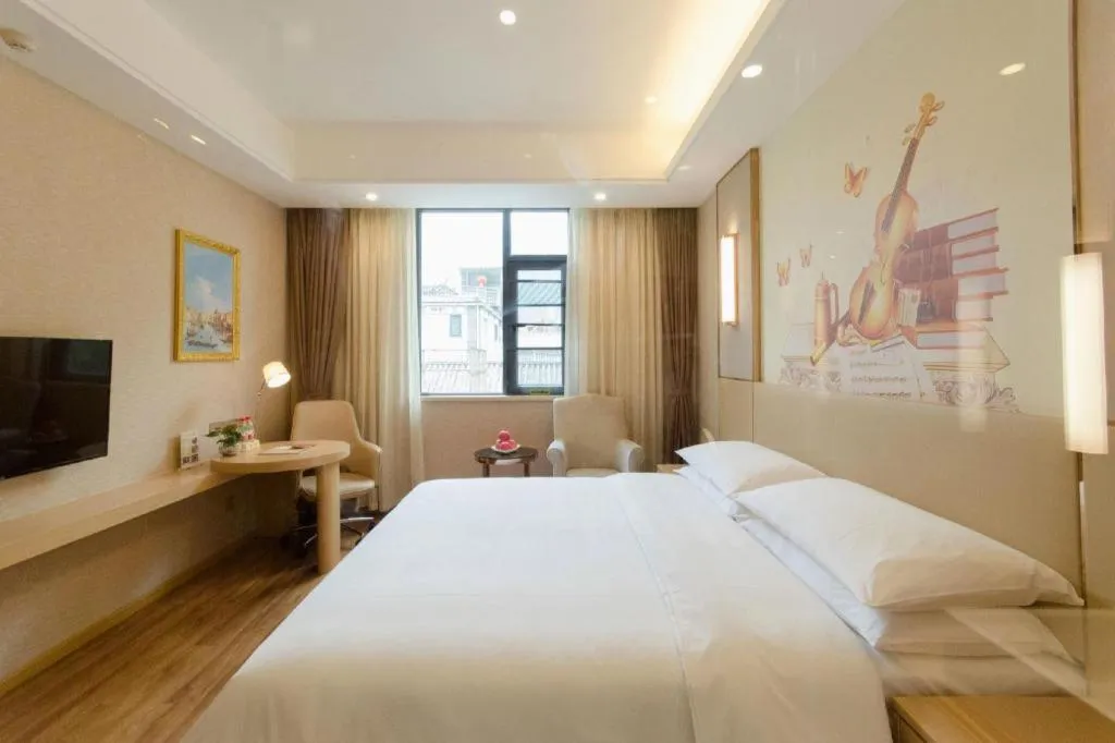 Bed in Vienna Hotel Yunnan Dali Ancient City Scenic Spot