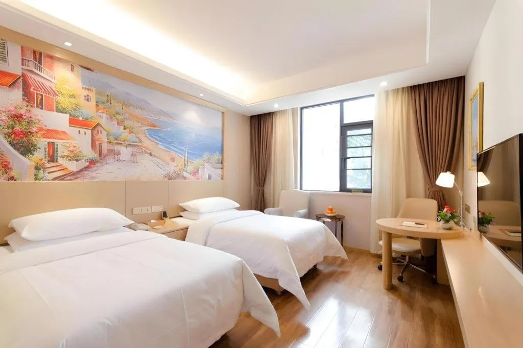 Bed in Vienna Hotel Yunnan Dali Ancient City Scenic Spot