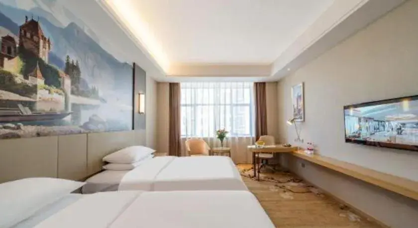 Bed in Vienna Hotel Guangdong Shaoguan Shaonan Avenue Bed in Vienna Hotel Guangdong Shaoguan Shaonan Avenue