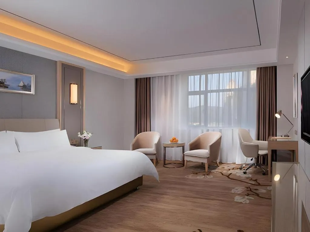 Bed in Vienna Hotel Guangdong Shaoguan Shaonan Avenue