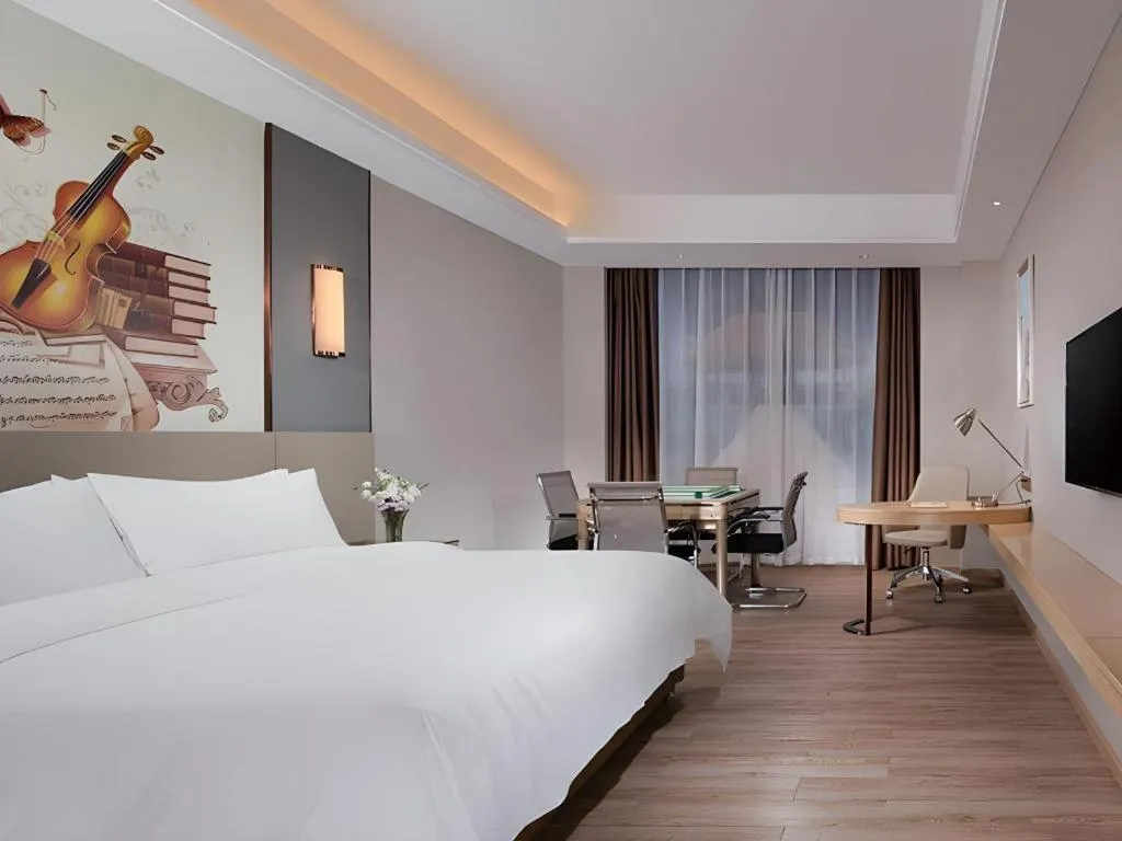 Bed in Vienna Hotel Guangdong Shaoguan Shaonan Avenue