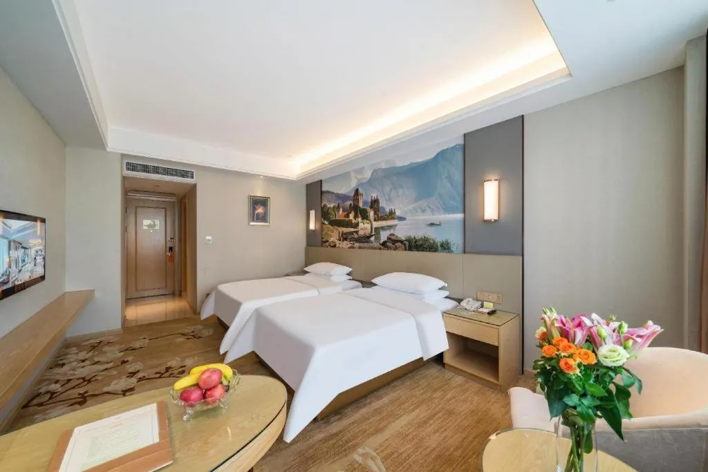 Bed in Vienna Hotel Guangdong Shaoguan Shaonan Avenue