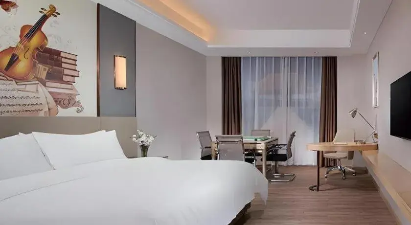 Bed in Vienna Hotel Guangdong Shaoguan Shaonan Avenue Bed in Vienna Hotel Guangdong Shaoguan Shaonan Avenue