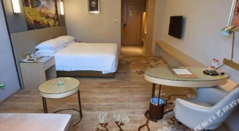 Bed in Vienna Hotel Guangdong Shaoguan Shaonan Avenue