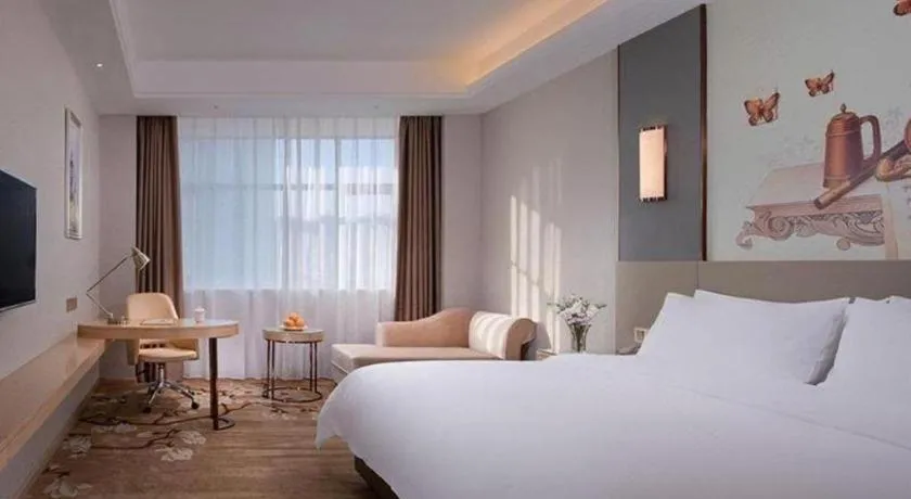 Bed in Vienna Hotel Guangdong Shaoguan Shaonan Avenue