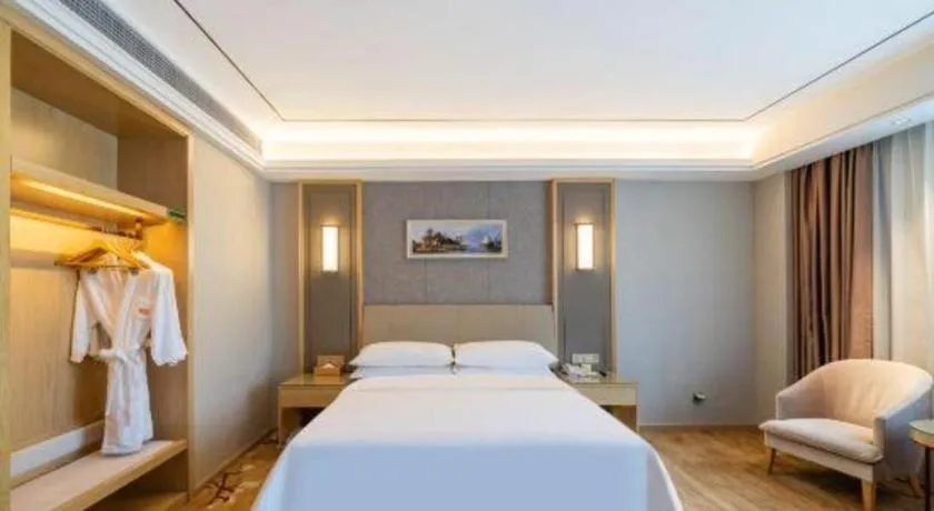Bed in Vienna Hotel Guangdong Shaoguan Shaonan Avenue