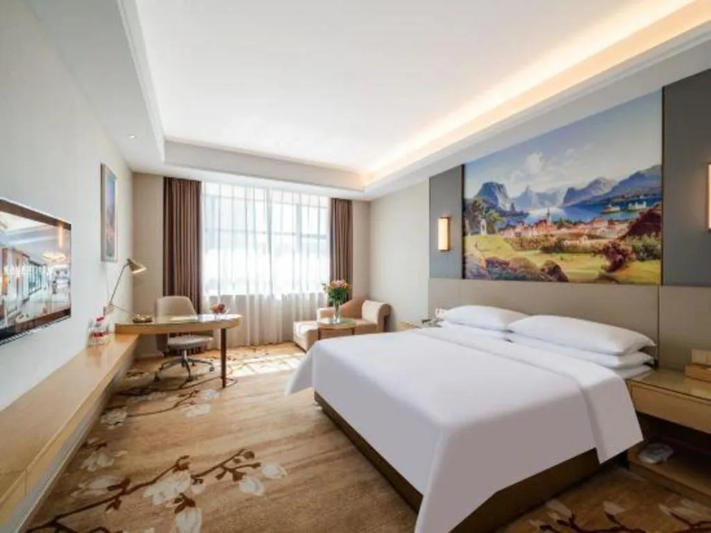 Bed in Vienna Hotel Guangdong Shaoguan Shaonan Avenue