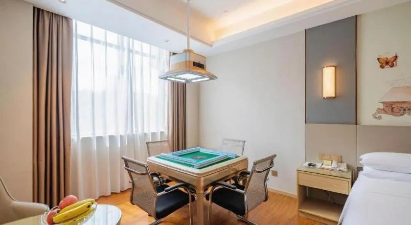 Bed in Vienna Hotel Guangdong Shaoguan Shaonan Avenue