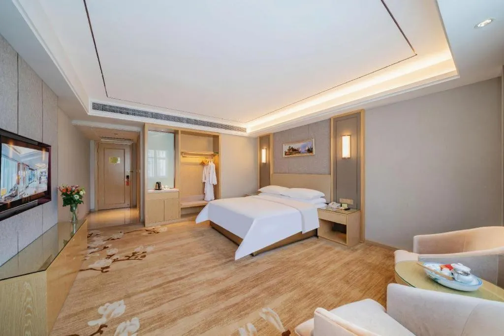 Bed in Vienna Hotel Guangdong Shaoguan Shaonan Avenue