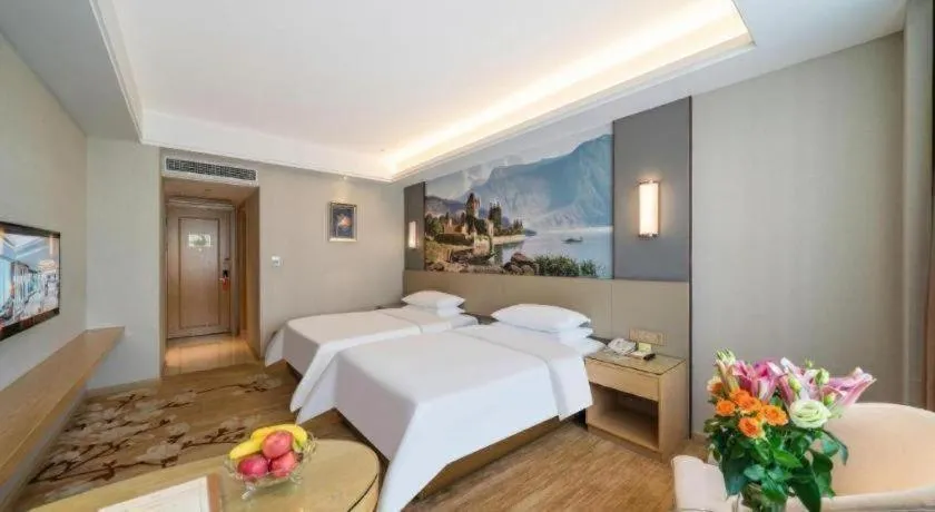 Bed in Vienna Hotel Guangdong Shaoguan Shaonan Avenue