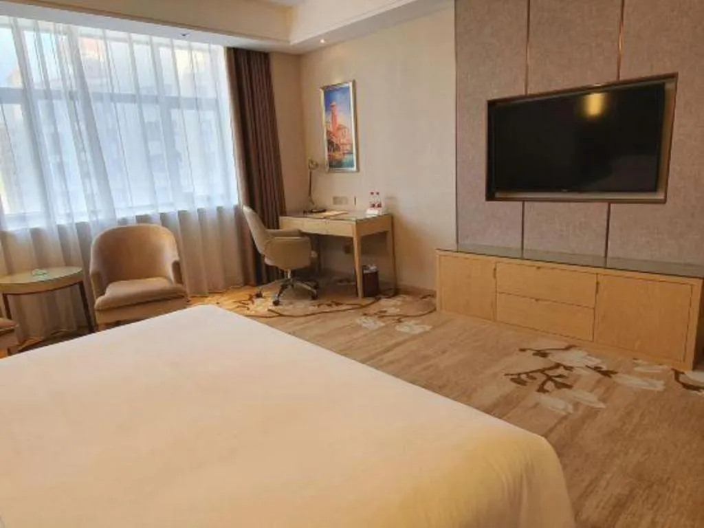 Bed in Vienna Hotel Guangdong Shaoguan Shaonan Avenue