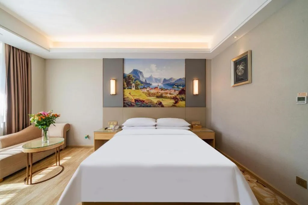 Bed in Vienna Hotel Guangdong Shaoguan Shaonan Avenue