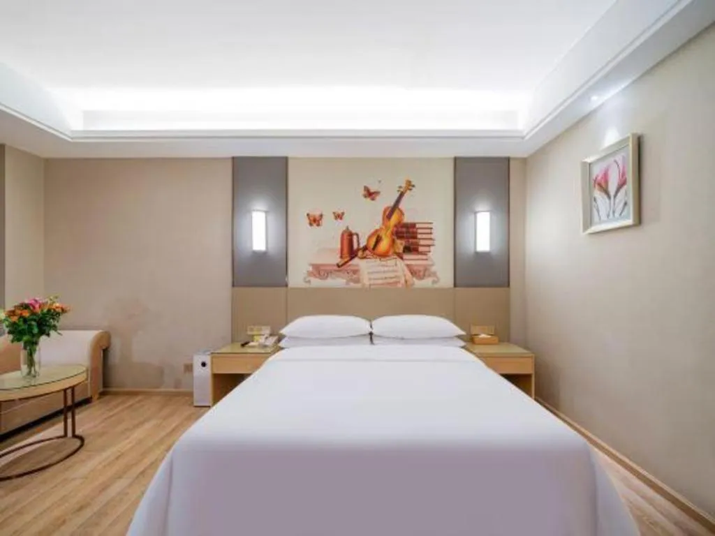 Bed in Vienna Hotel Guangdong Shaoguan Shaonan Avenue