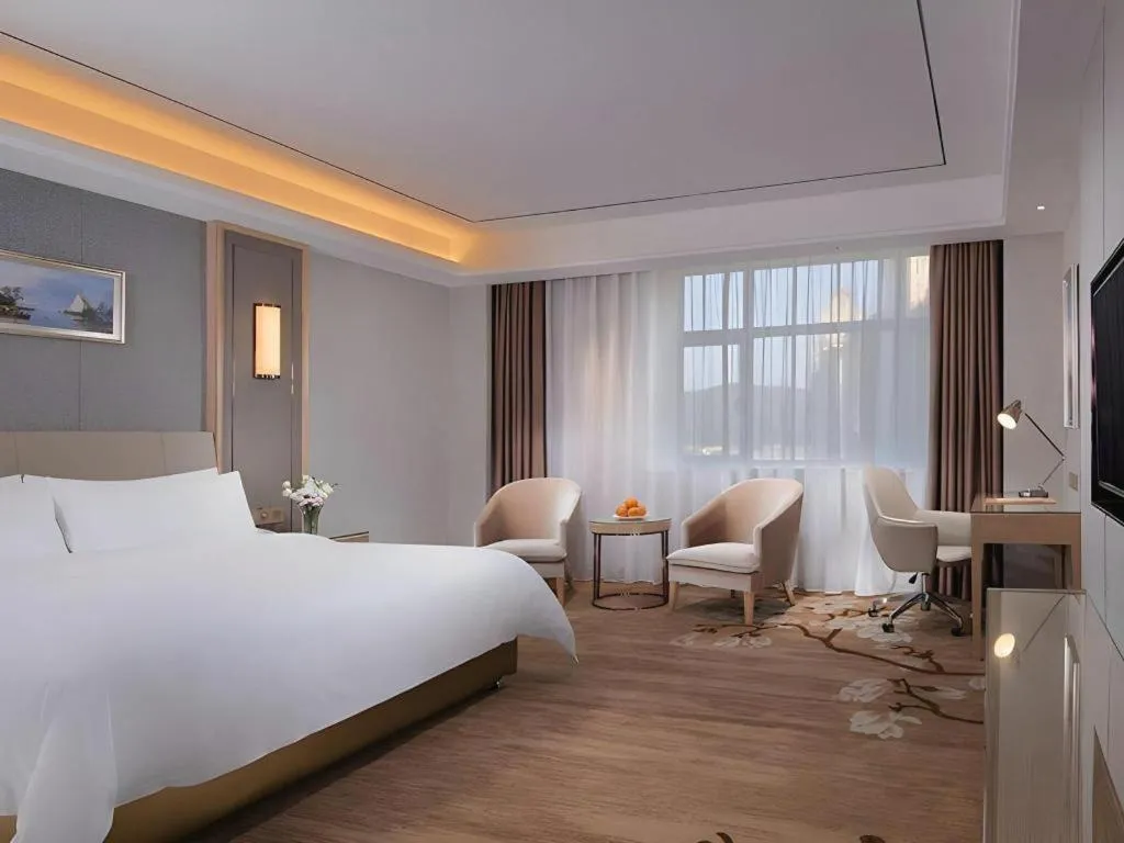 Bed in Vienna Hotel Guangdong Shaoguan Shaonan Avenue