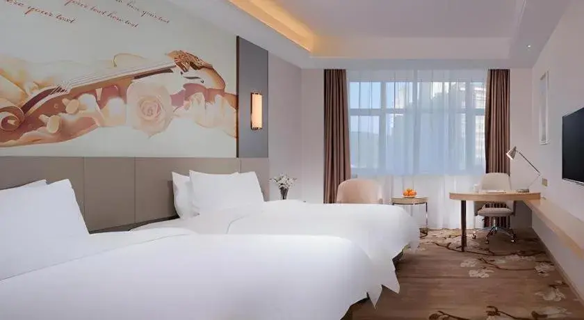 Bed in Vienna Hotel Guangdong Shaoguan Shaonan Avenue Bed in Vienna Hotel Guangdong Shaoguan Shaonan Avenue