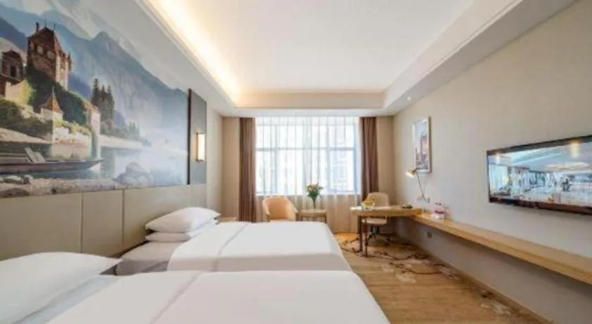 Bed in Vienna Hotel Guangdong Shaoguan Shaonan Avenue