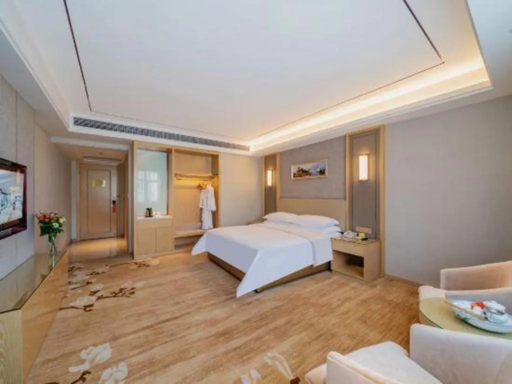Bed in Vienna Hotel Guangdong Shaoguan Shaonan Avenue