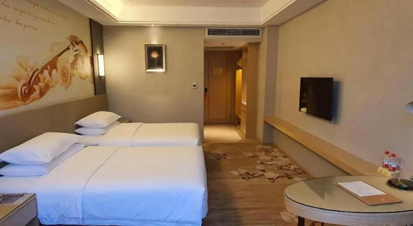 Bed in Vienna Hotel Guangdong Shaoguan Shaonan Avenue