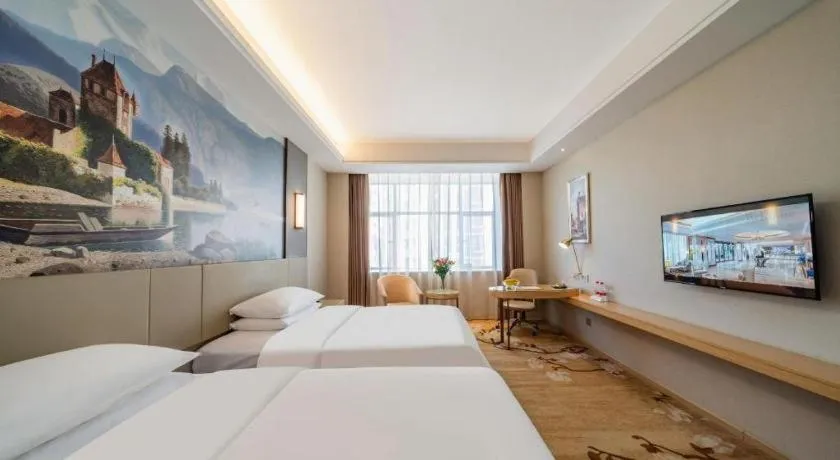 Bed in Vienna Hotel Guangdong Shaoguan Shaonan Avenue
