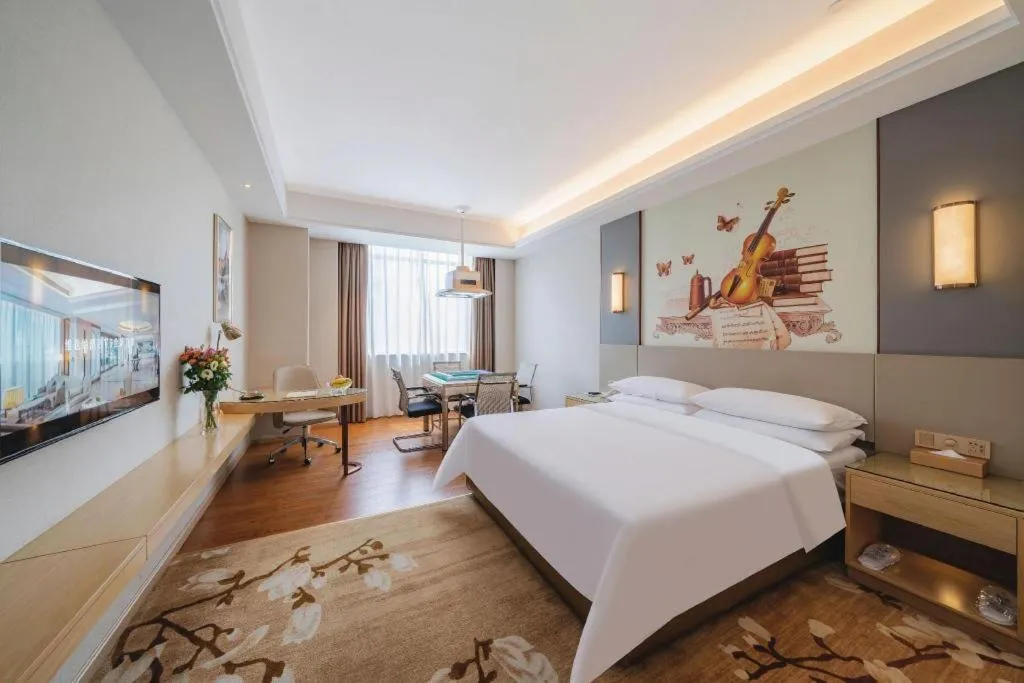 Bed in Vienna Hotel Guangdong Shaoguan Shaonan Avenue