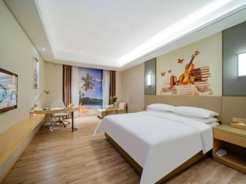 Bed in Vienna Hotel Guangdong Shaoguan Shaonan Avenue