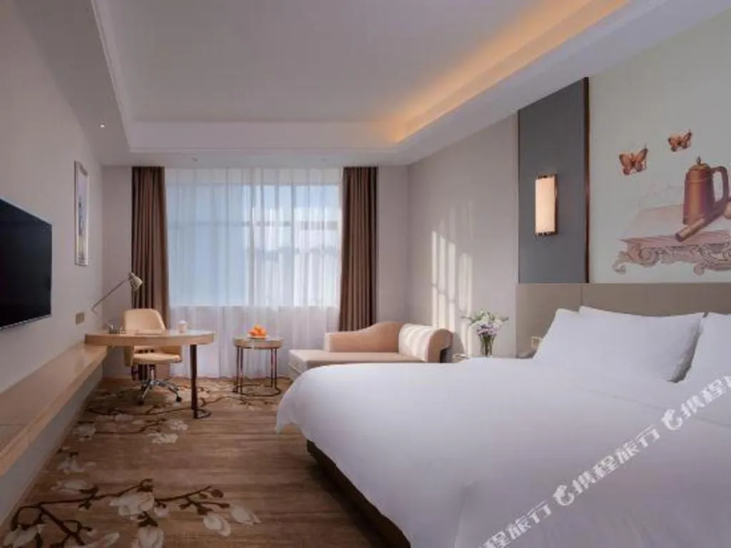 Bed in Vienna Hotel Guangdong Shaoguan Shaonan Avenue