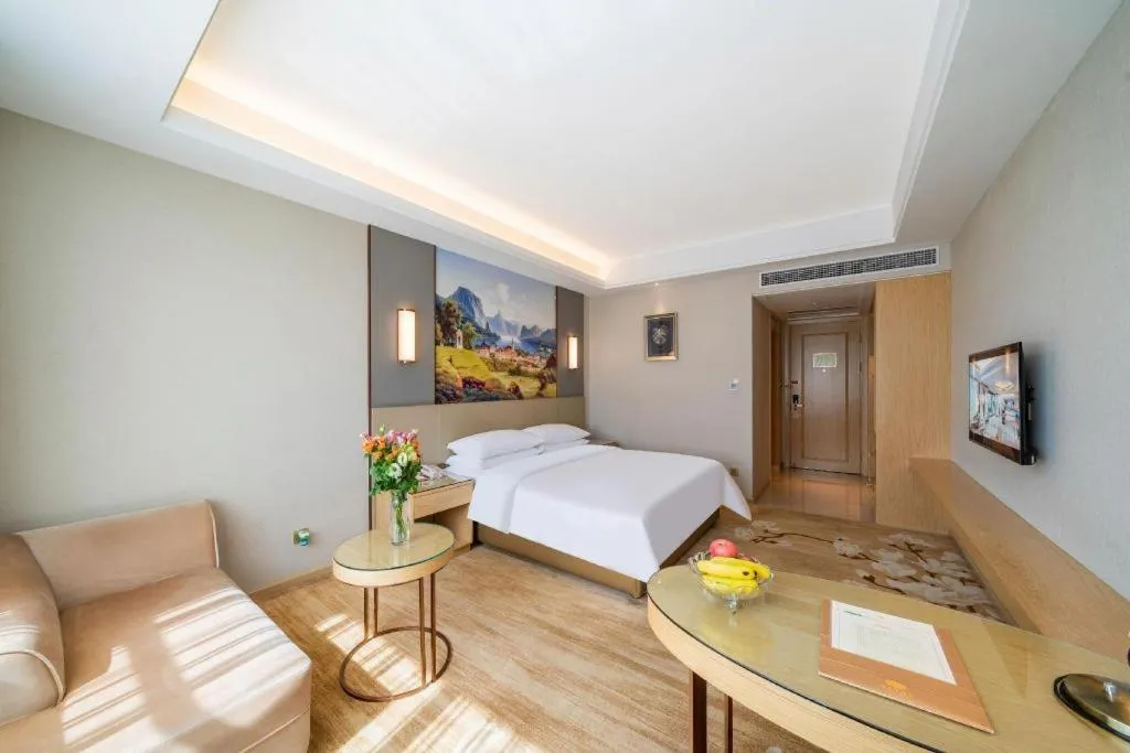 Bed in Vienna Hotel Guangdong Shaoguan Shaonan Avenue