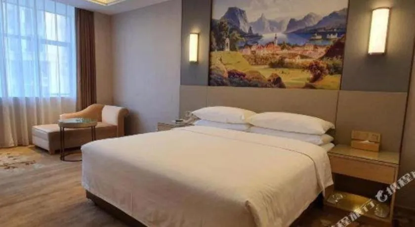 Bed in Vienna Hotel Guangdong Shaoguan Shaonan Avenue
