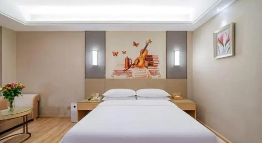Bed in Vienna Hotel Guangdong Shaoguan Shaonan Avenue Bed in Vienna Hotel Guangdong Shaoguan Shaonan Avenue