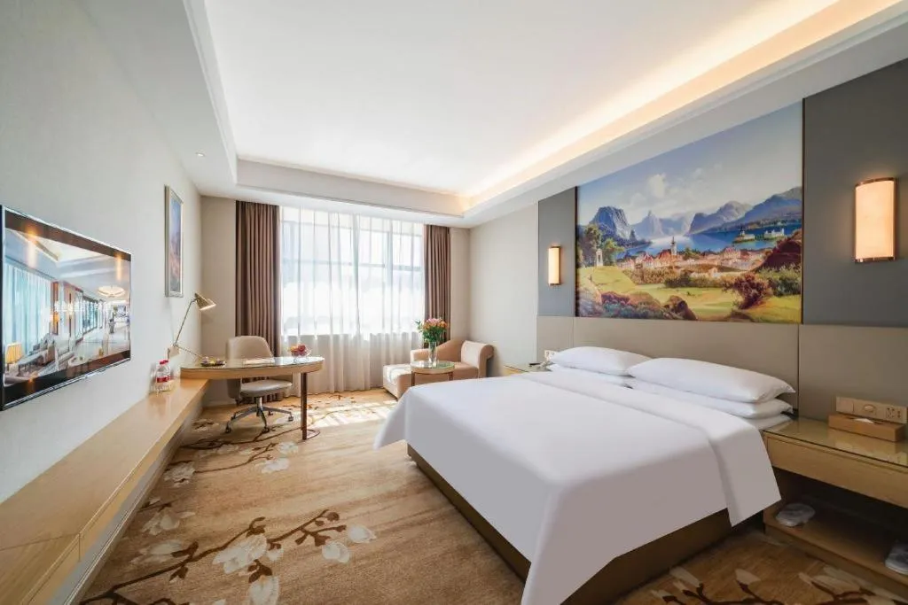 Bed in Vienna Hotel Guangdong Shaoguan Shaonan Avenue