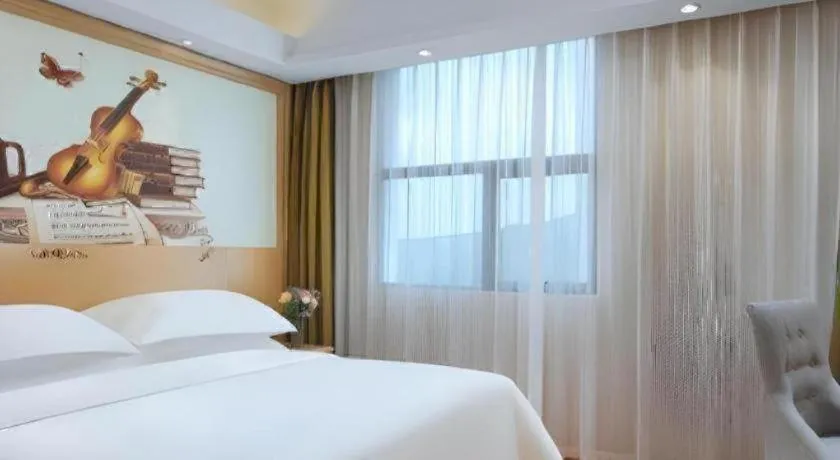 Bed in Vienna Hotel Shandong Qingdao Taidong Pijiu Street Liaoning Road