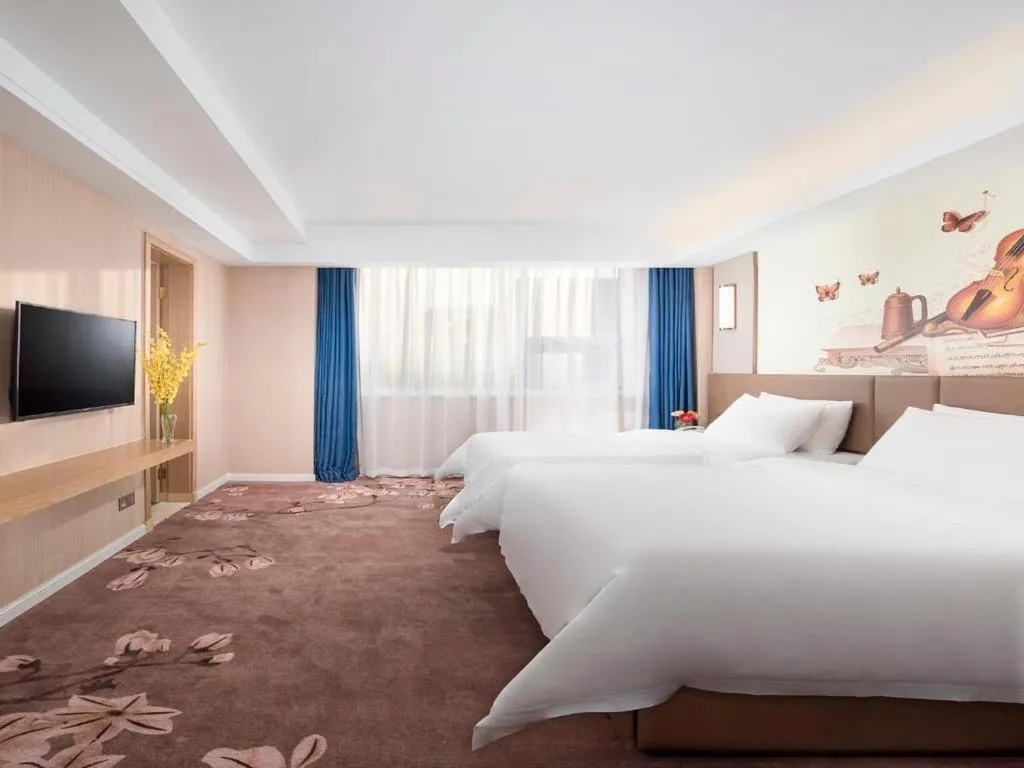 Bed in Vienna Hotel Shandong Qingdao Taidong Pijiu Street Liaoning Road