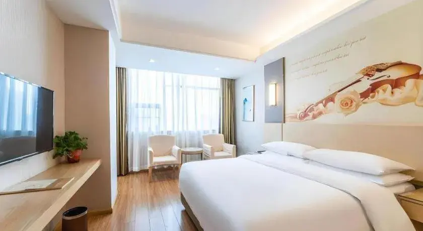 Bed in Vienna Hotel Hunan Huaihua Xupu Wanda Plaza Bed in Vienna Hotel Hunan Huaihua Xupu Wanda Plaza