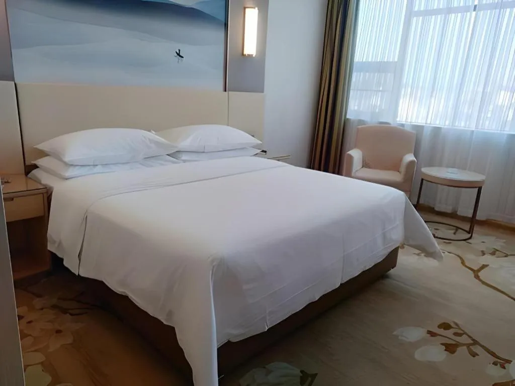 Bed in Vienna Hotel Hunan Huaihua Xupu Wanda Plaza