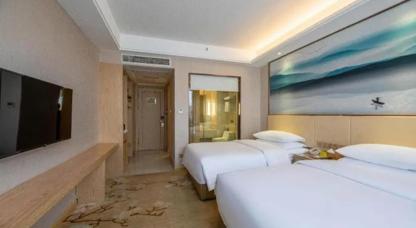 Bed in Vienna Hotel Hunan Huaihua Xupu Wanda Plaza