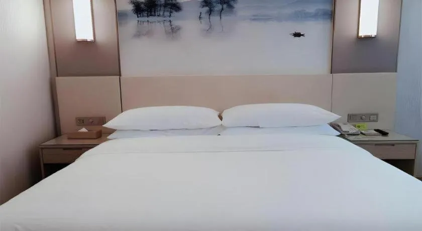 Bed in Vienna Hotel Hunan Huaihua Xupu Wanda Plaza