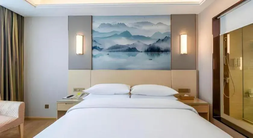 Bed in Vienna Hotel Hunan Huaihua Xupu Wanda Plaza Bed in Vienna Hotel Hunan Huaihua Xupu Wanda Plaza