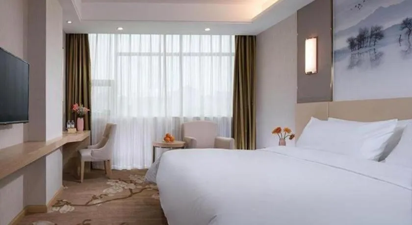 Bed in Vienna Hotel Hunan Huaihua Xupu Wanda Plaza