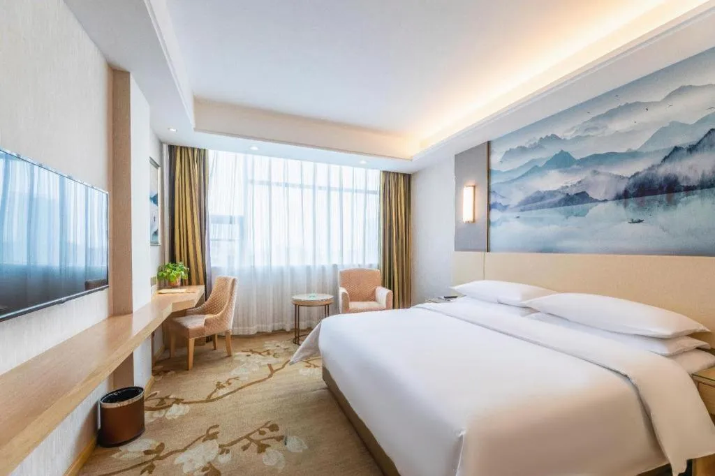 Bed in Vienna Hotel Hunan Huaihua Xupu Wanda Plaza