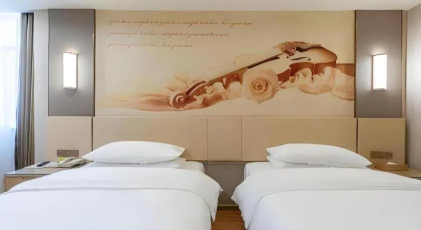 Bed in Vienna Hotel Hunan Huaihua Xupu Wanda Plaza