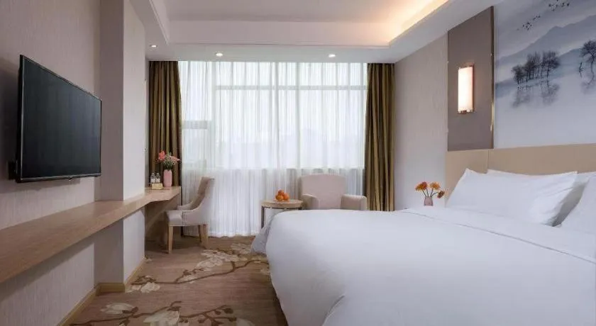 Bed in Vienna Hotel Hunan Huaihua Xupu Wanda Plaza