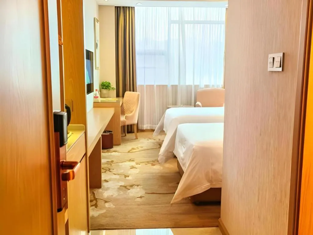 Bed in Vienna Hotel Hunan Huaihua Xupu Wanda Plaza