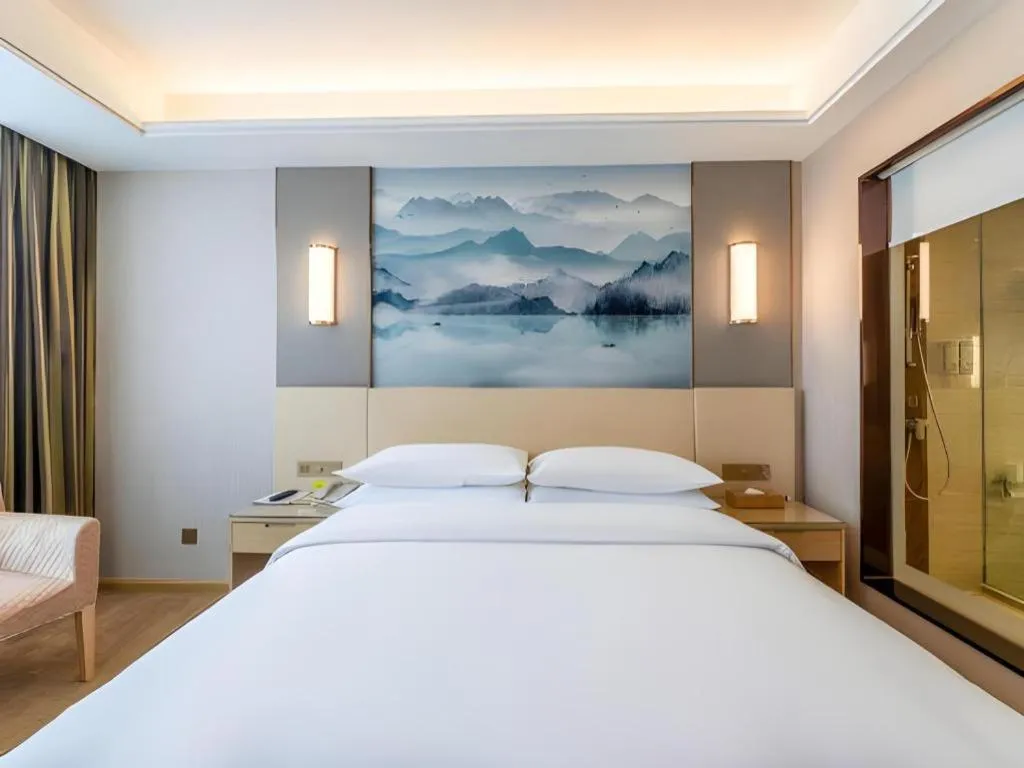 Bed in Vienna Hotel Hunan Huaihua Xupu Wanda Plaza