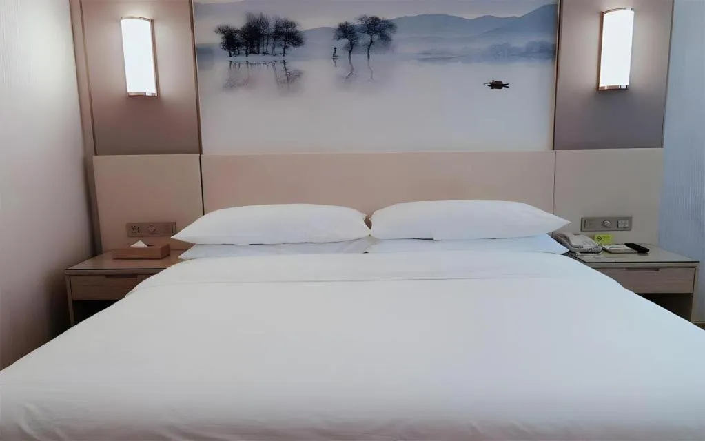 Bed in Vienna Hotel Hunan Huaihua Xupu Wanda Plaza