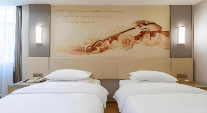 Bed in Vienna Hotel Hunan Huaihua Xupu Wanda Plaza