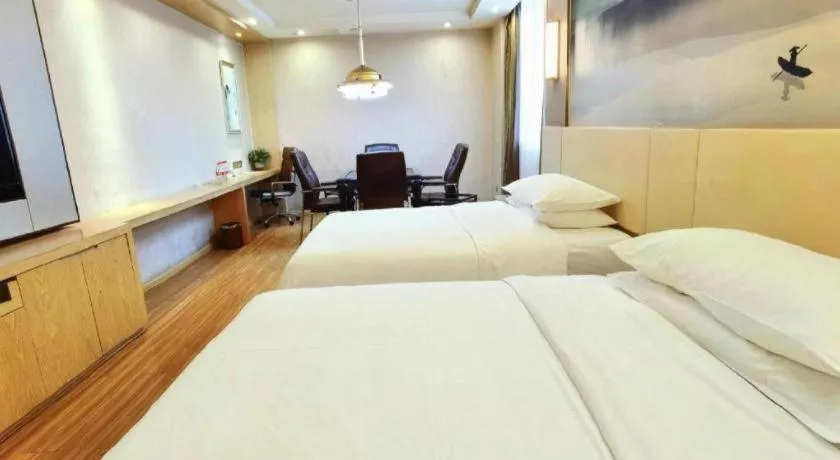 Bed in Vienna Hotel Hunan Huaihua Xupu Wanda Plaza