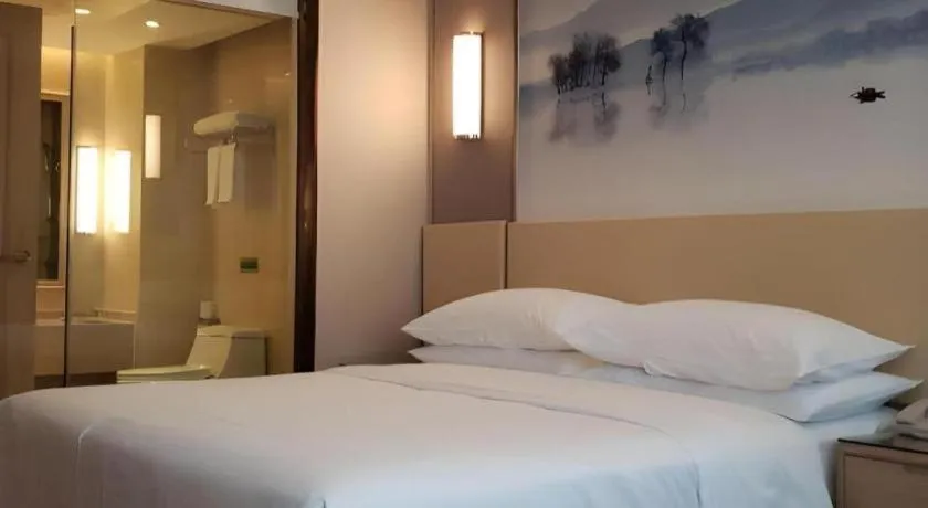 Bed in Vienna Hotel Hunan Huaihua Xupu Wanda Plaza