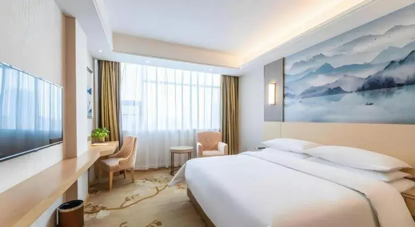 Bed in Vienna Hotel Hunan Huaihua Xupu Wanda Plaza Bed in Vienna Hotel Hunan Huaihua Xupu Wanda Plaza